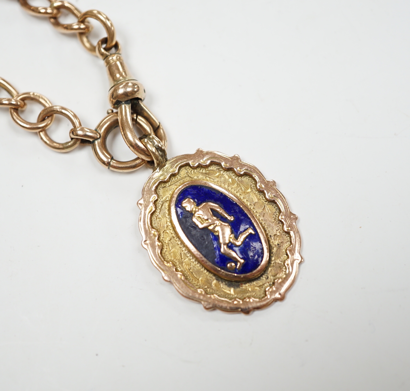 A 9ct gold albert, 38cm, hung with a 9ct gold and enamel football related medal engraved 'L .&. D F.A. Runners Up 1928-9', gross weight 28.9 grams.